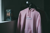 pink and white pullover hoodie