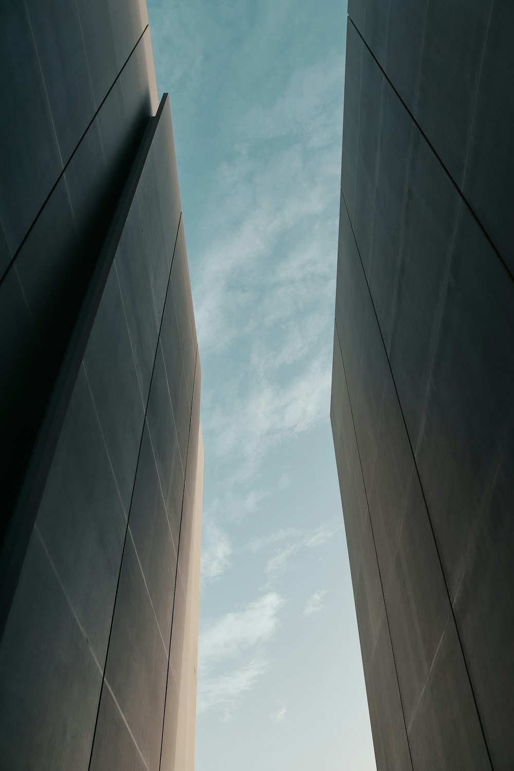 white concrete building under blue sky during daytime