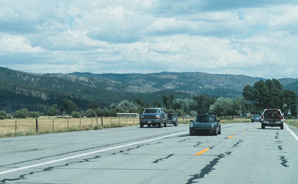 black car on road during daytime