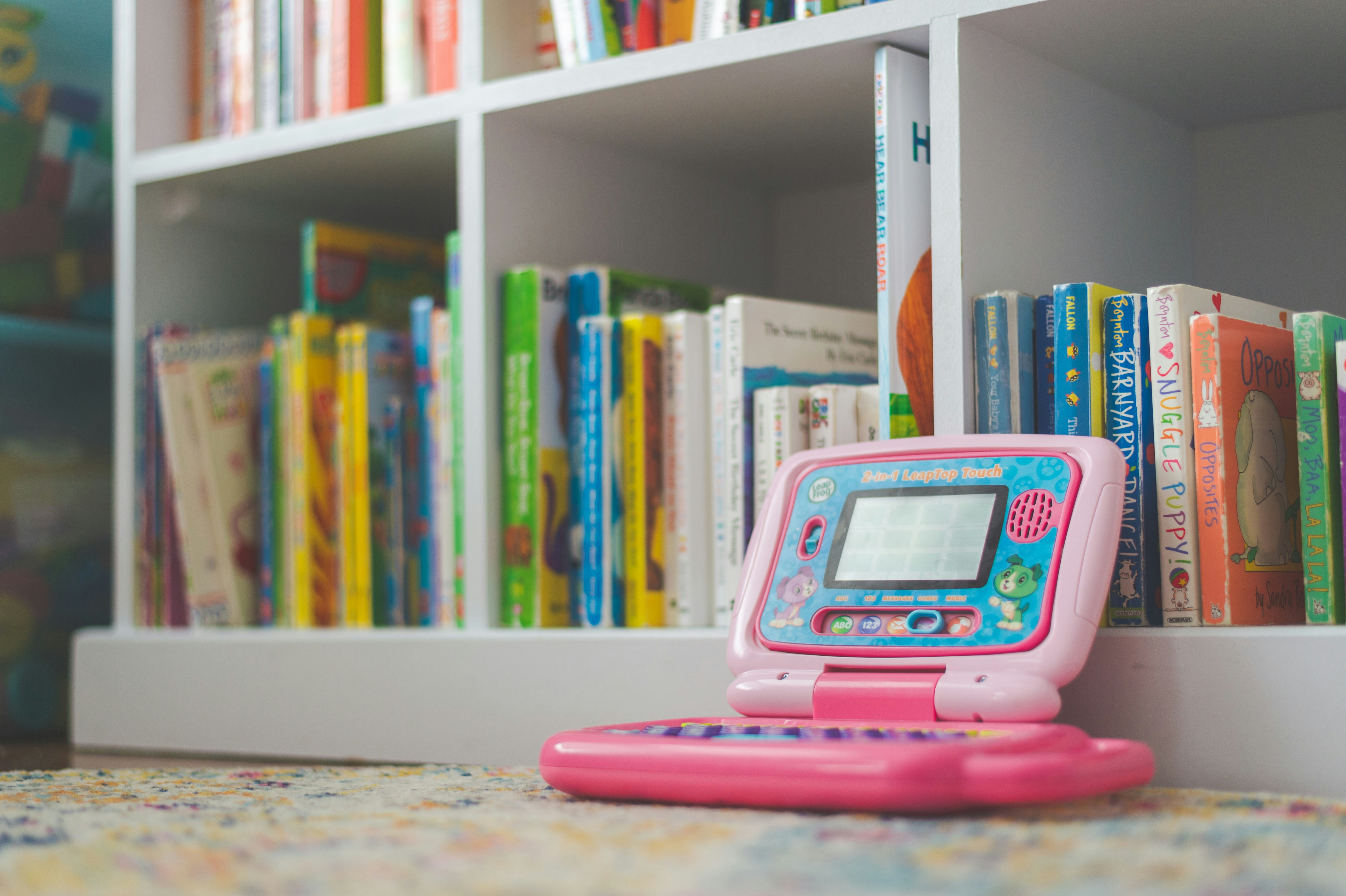 pink and white digital device