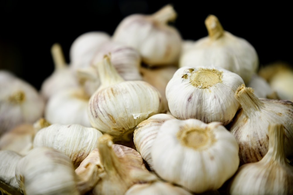 garlic on black background in close up photography