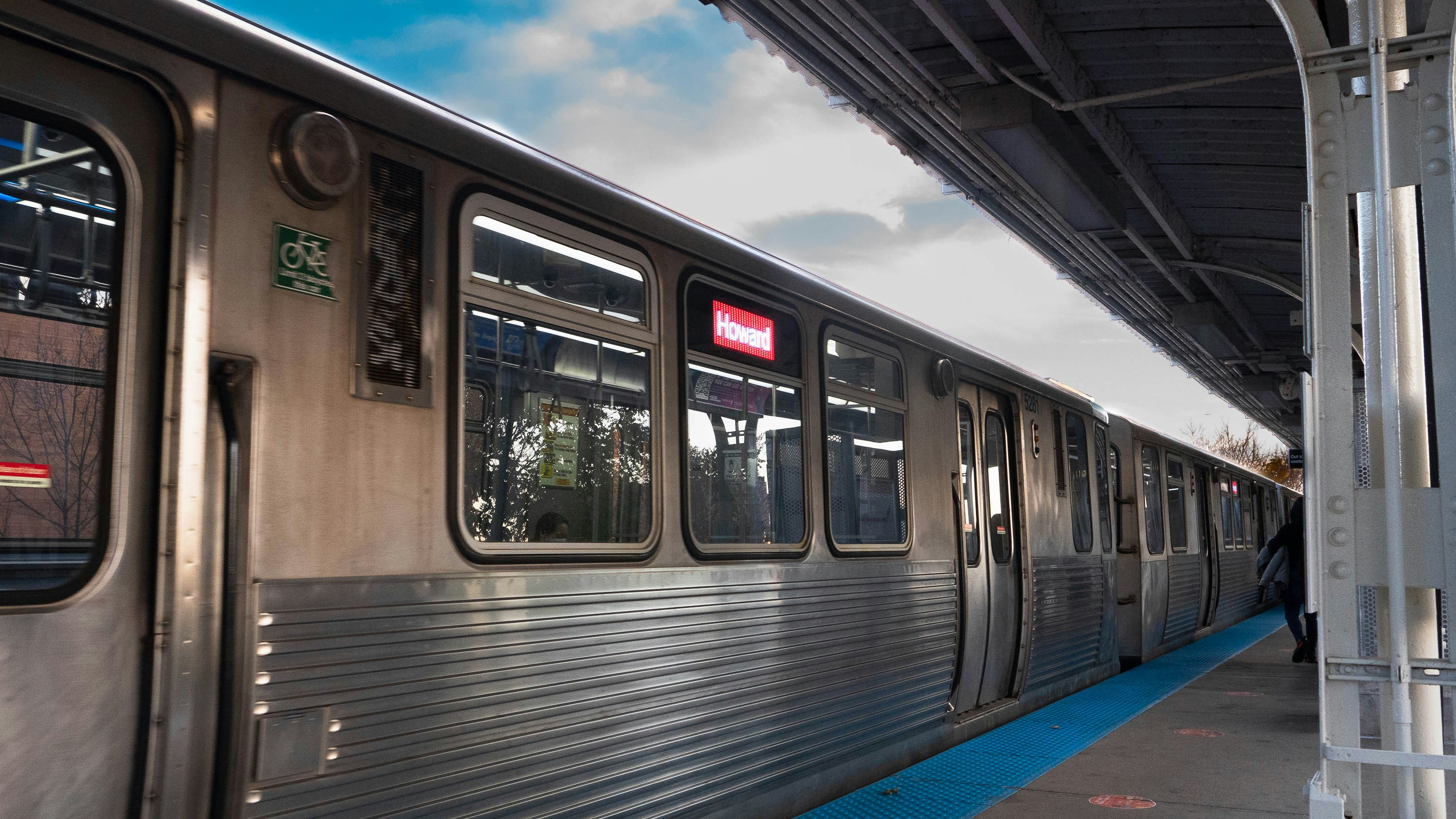 White and black train under white clouds