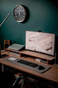 macbook pro on brown wooden desk