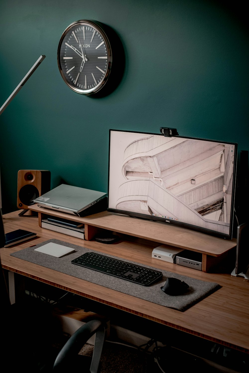 macbook pro on brown wooden desk