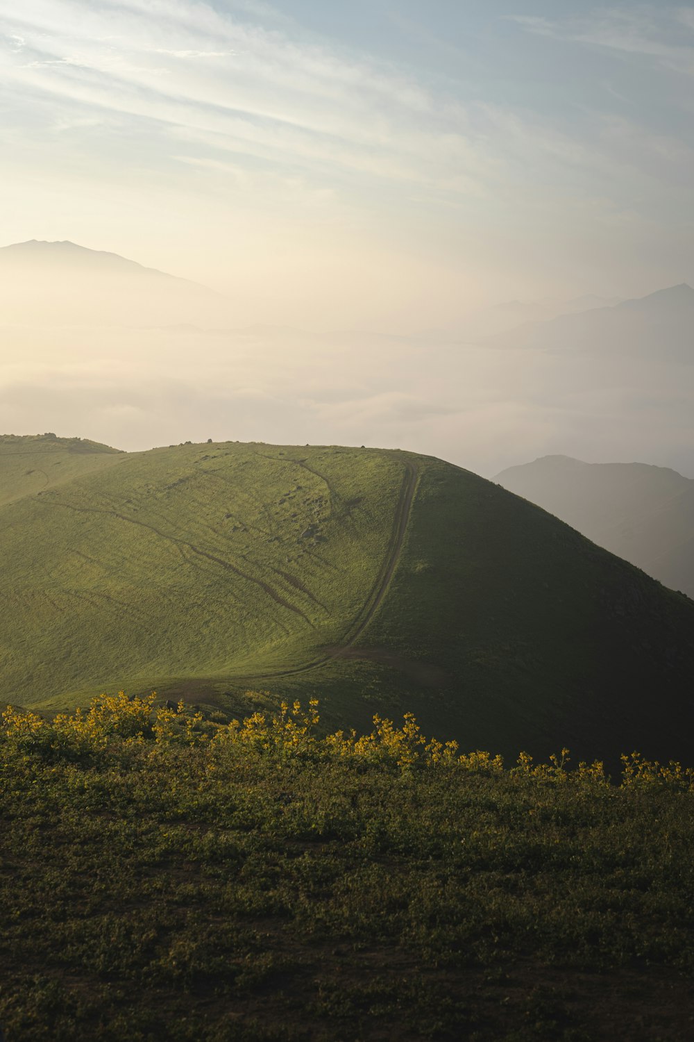 green mountain under white sky during daytime