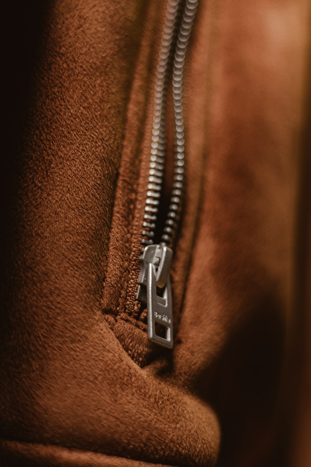 black and silver telephone on brown textile