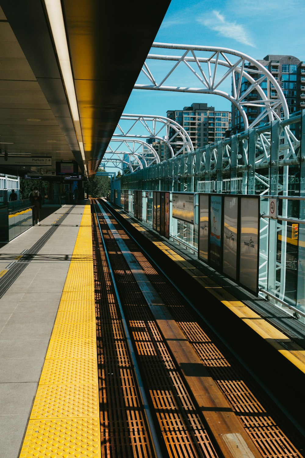 train station with white metal railings