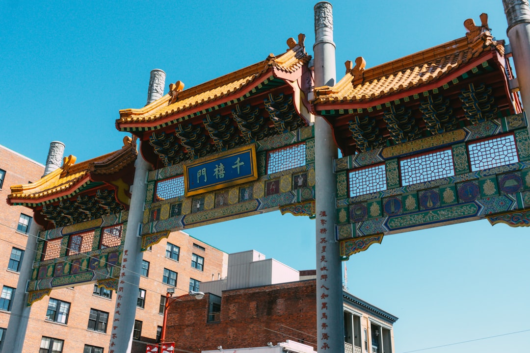 brown and beige concrete building under blue sky during daytime