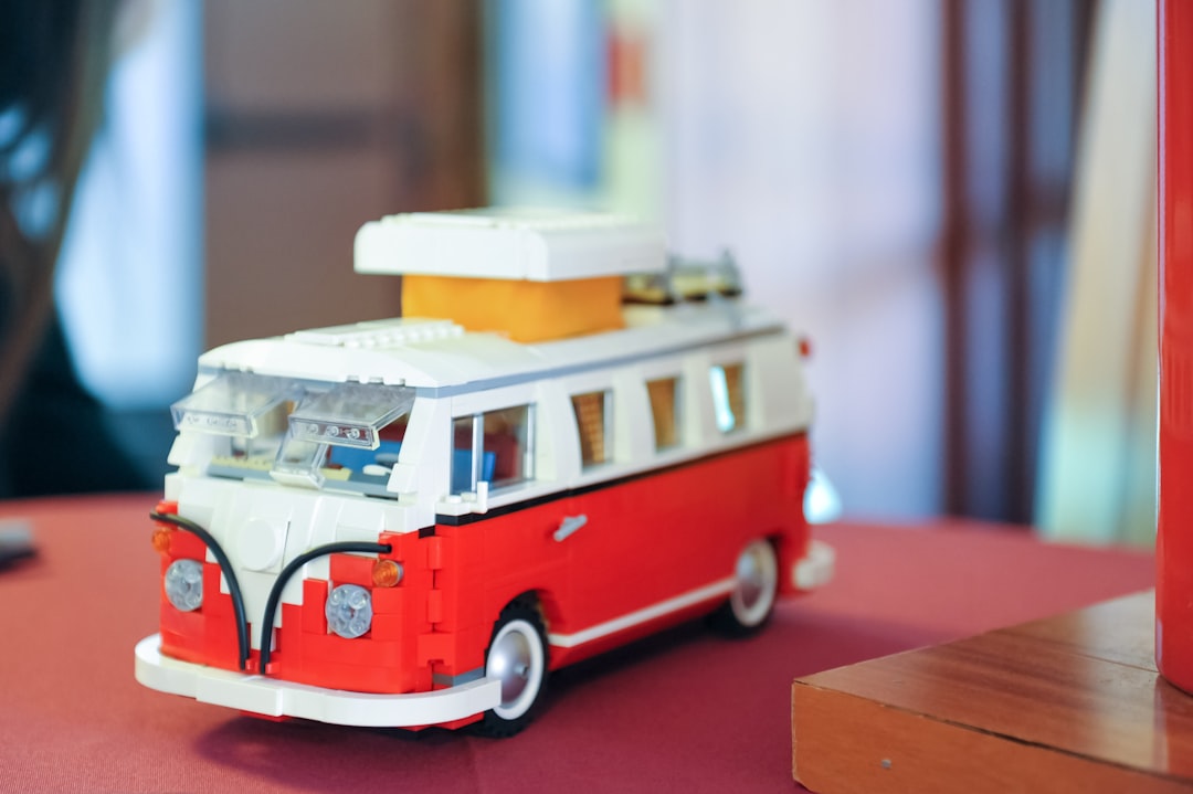 red and white volkswagen t-1 scale model