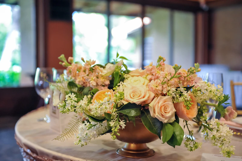 Sweetheart table with lush floral centerpiece