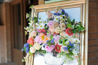 bouquet of flowers on white wooden table