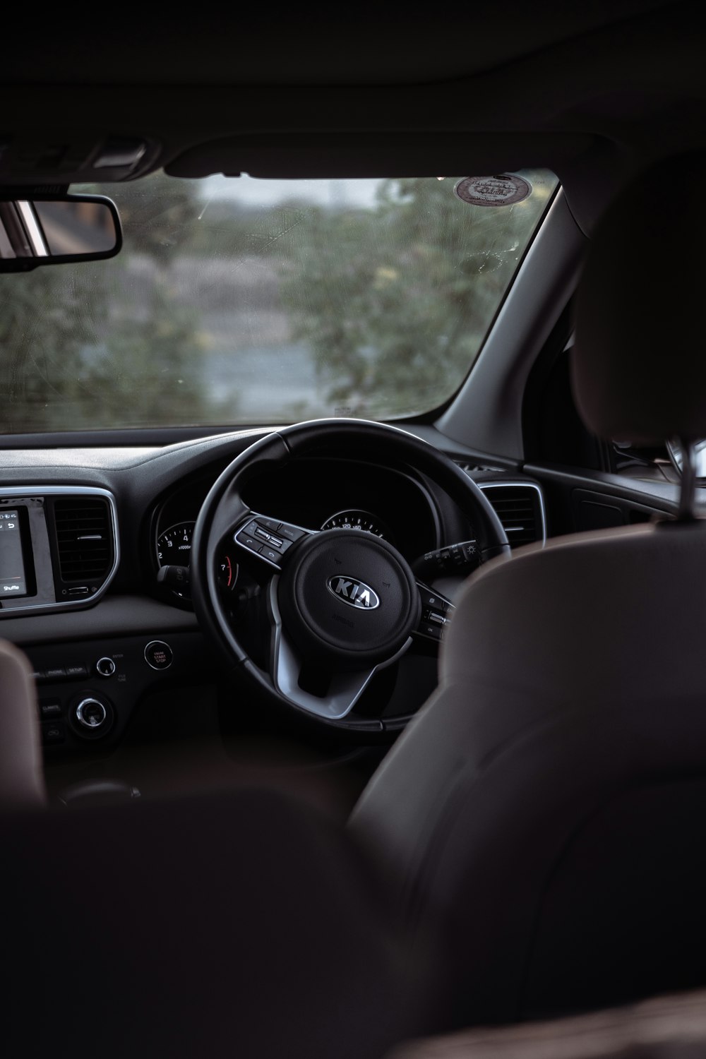 black and silver mercedes benz steering wheel