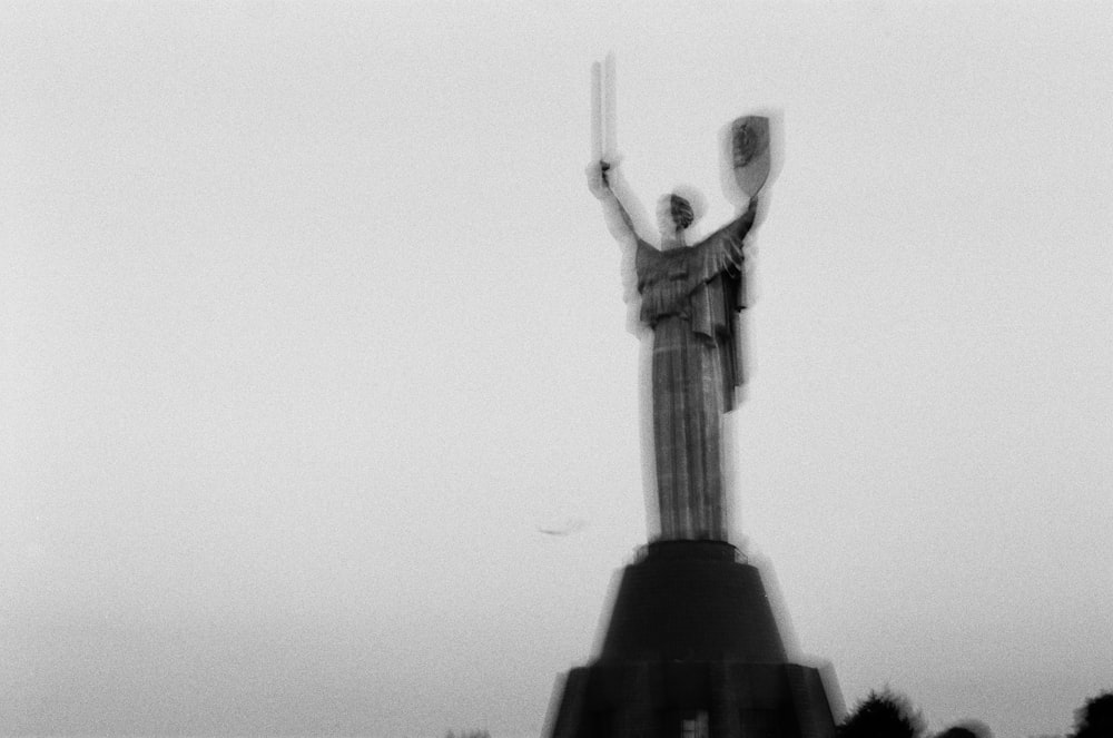 statue of liberty in grayscale photography