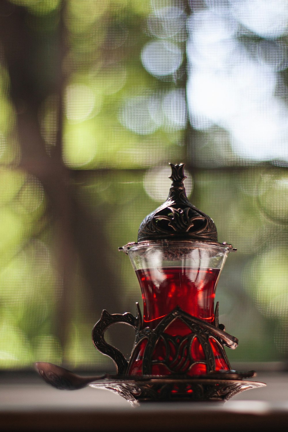 red and black glass cup