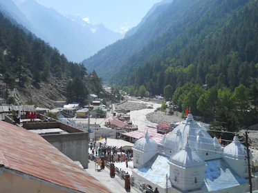 people walking on street near mountain during daytime