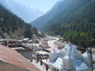 people walking on street near mountain during daytime