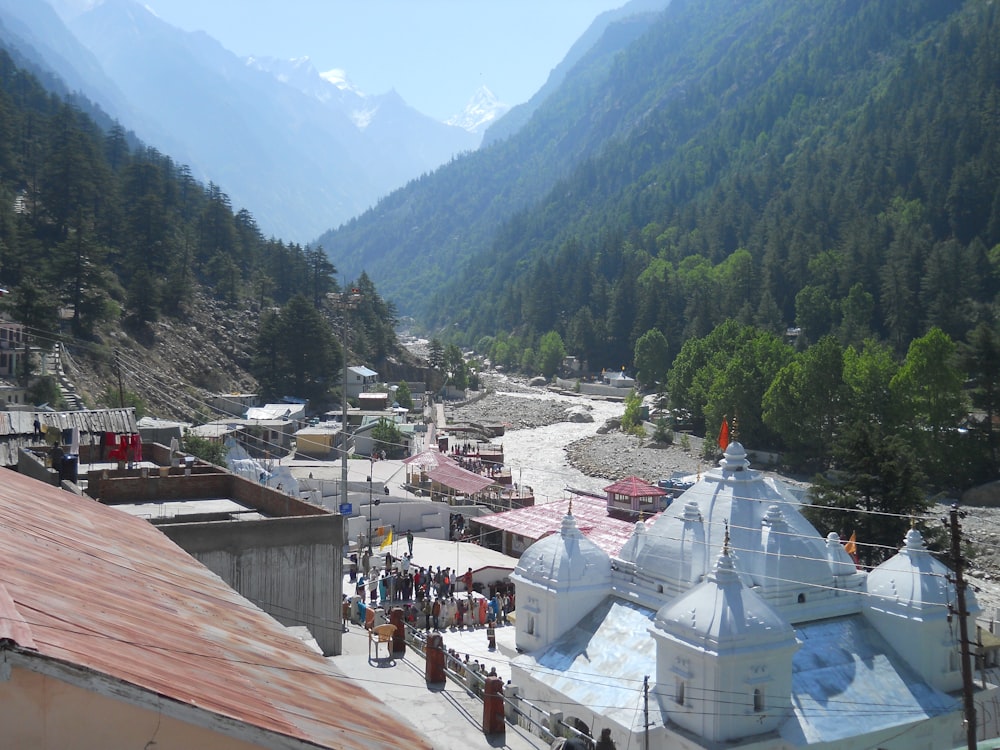 people walking on street near mountain during daytime