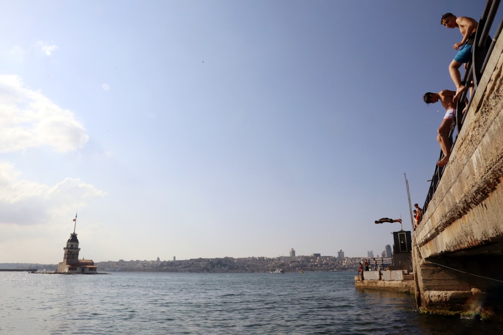 brown boat on sea during daytime