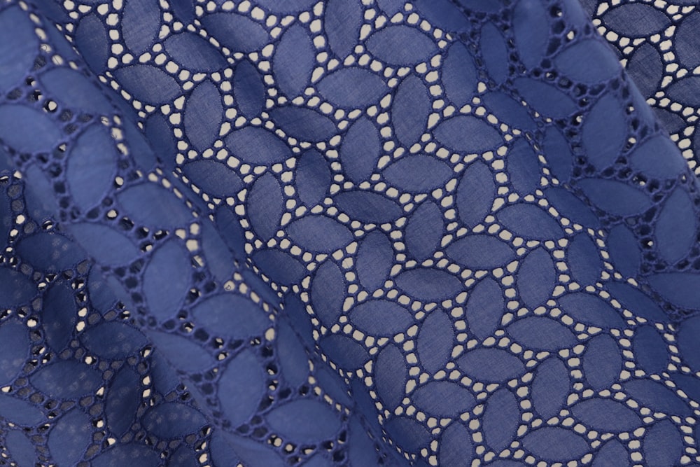 blue and white polka dot textile