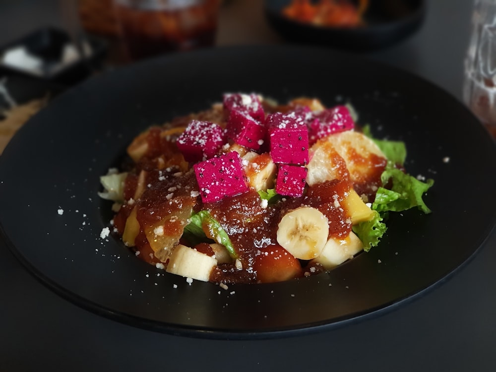 cooked food on black ceramic plate