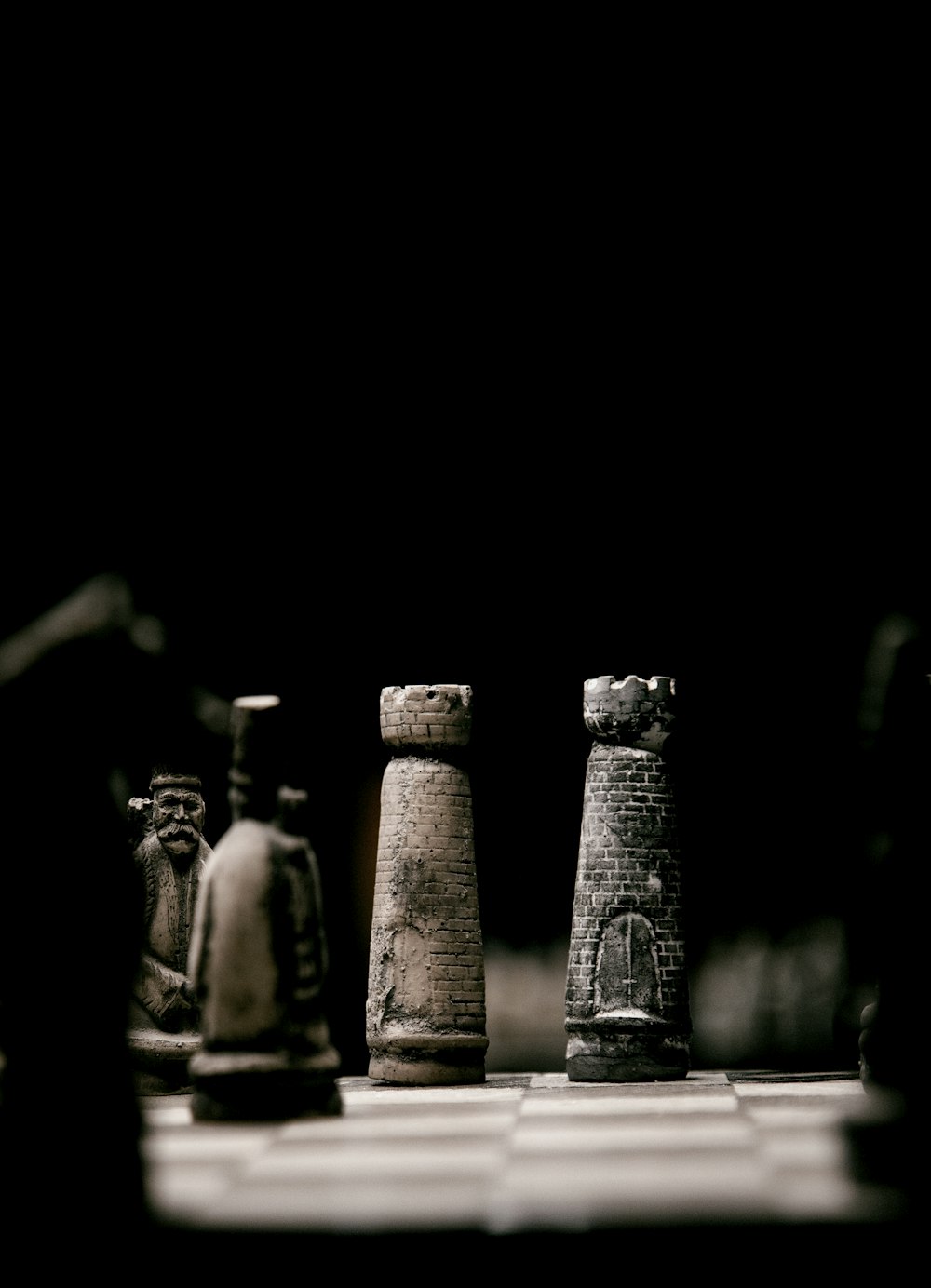 grayscale photo of concrete bottles