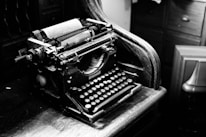 A vintage typewriter with absurd notes spilling out like confetti in a lively room.