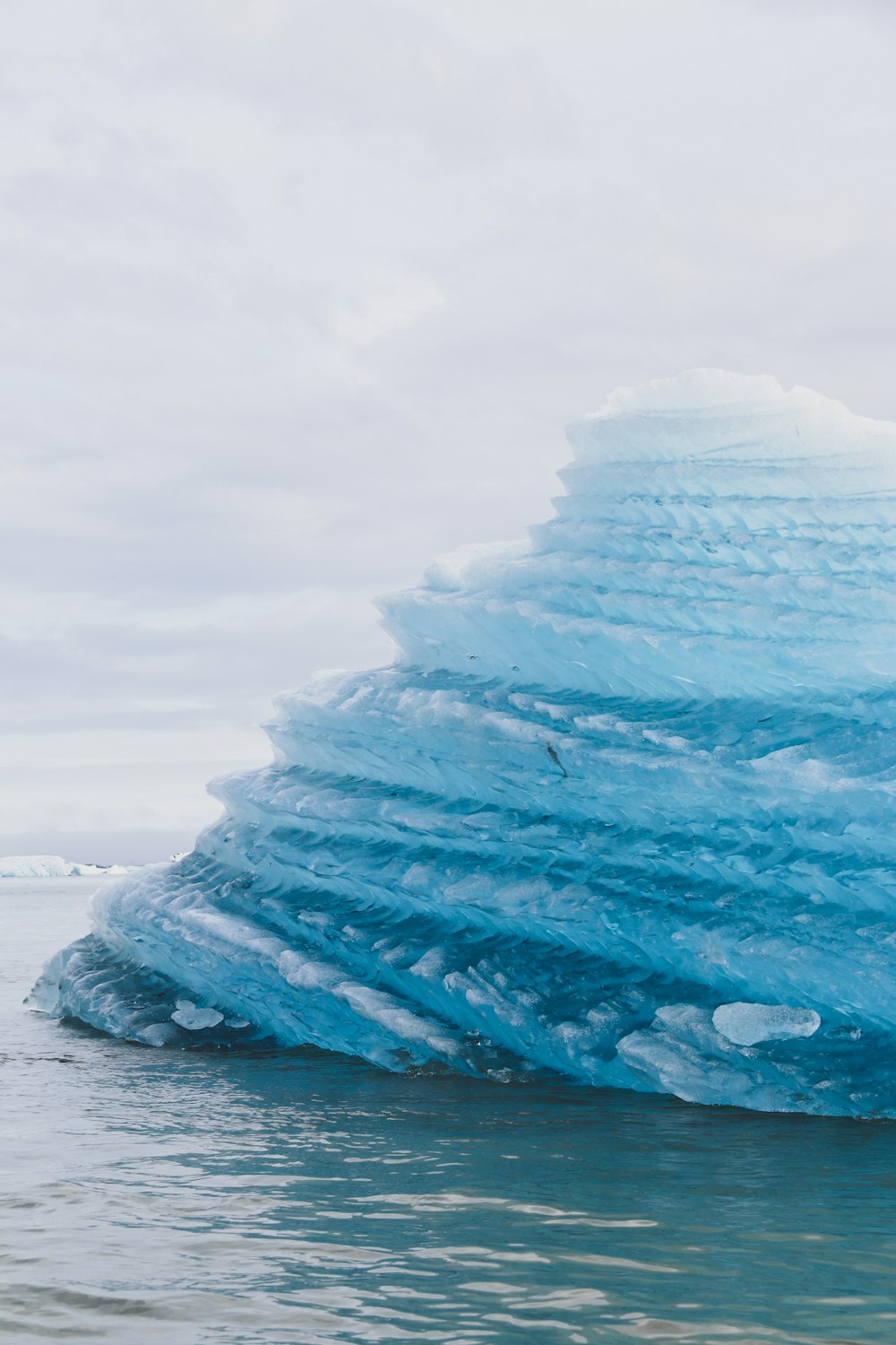 ice formation on body of water during daytime