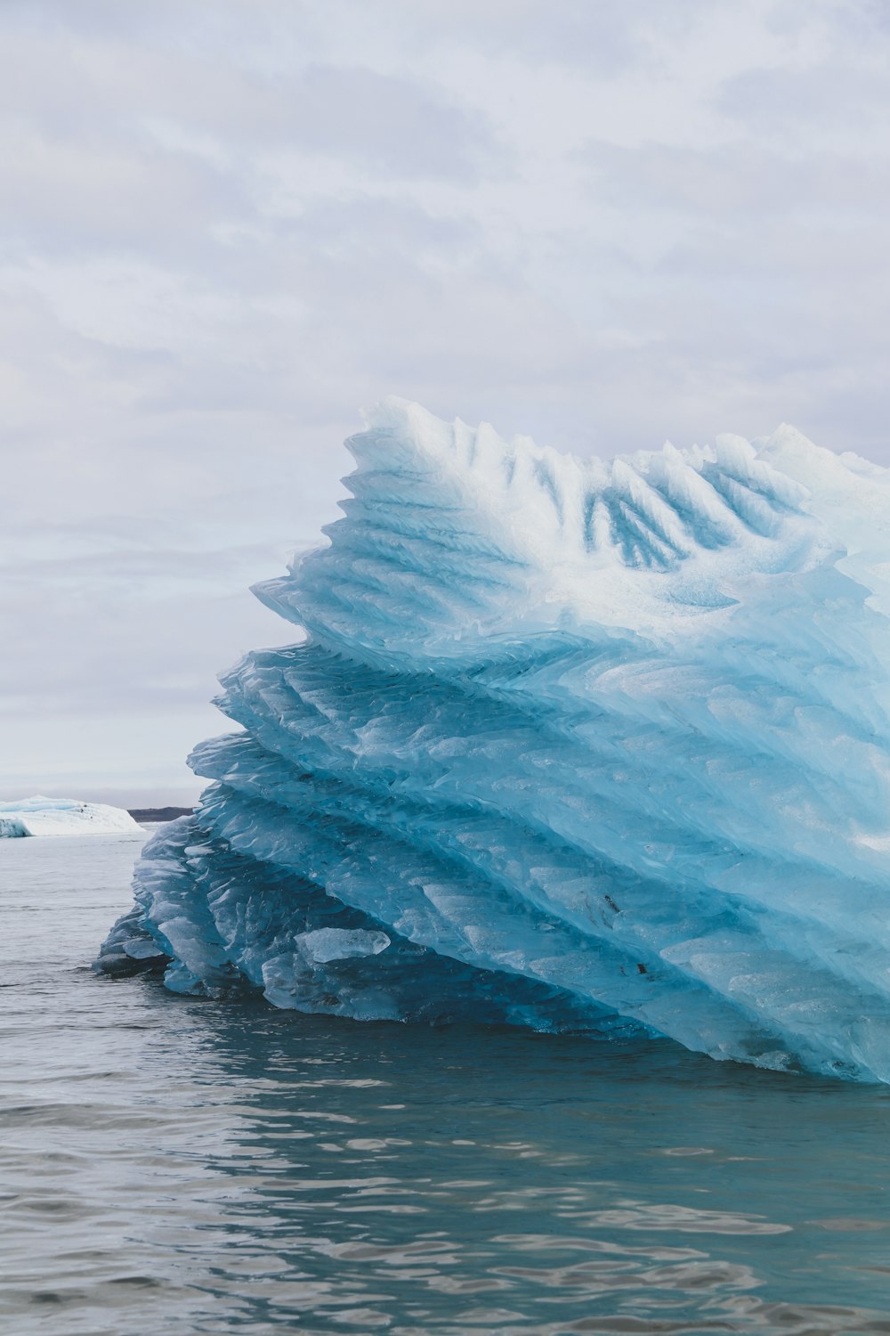 ice formation on body of water during daytime