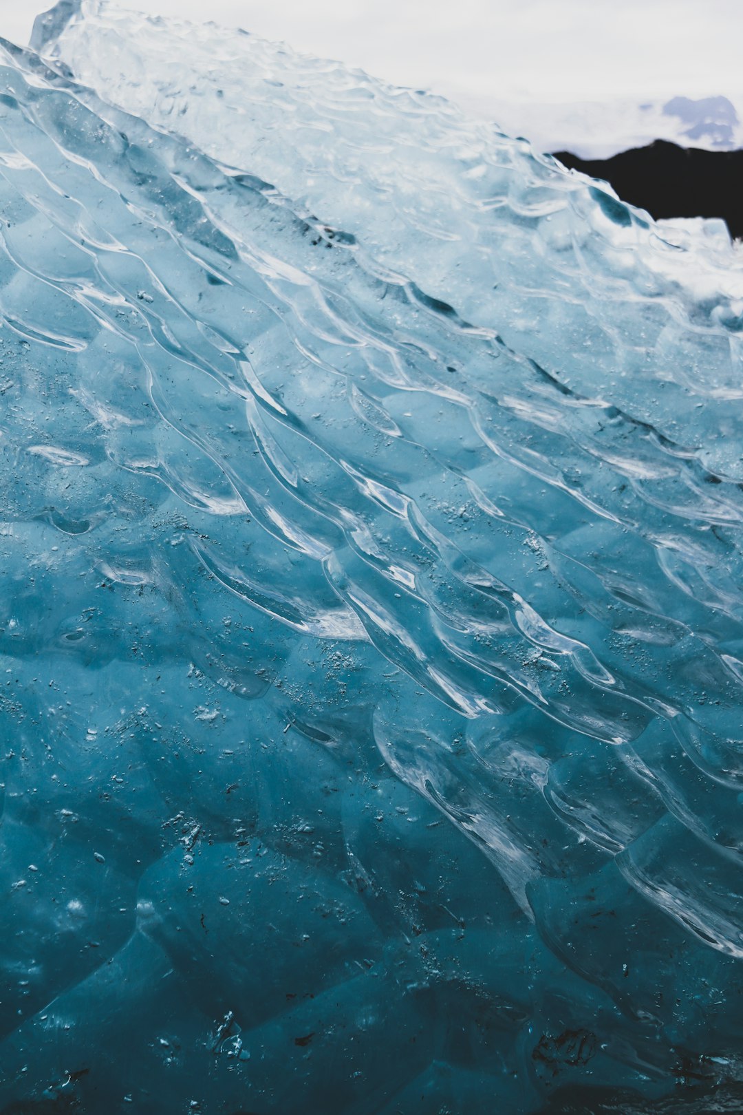 water droplets on blue textile