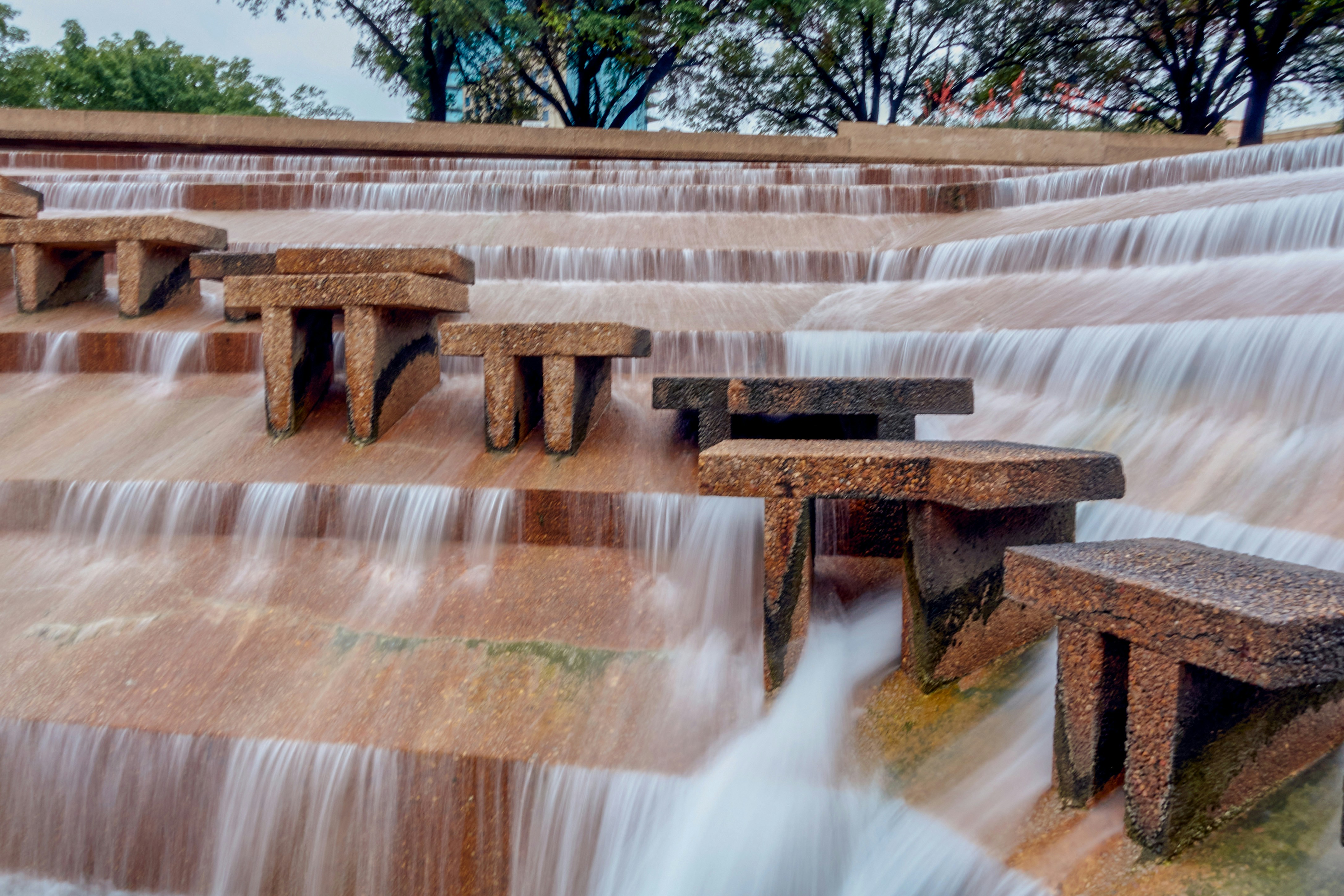 brown concrete fountain during daytime
