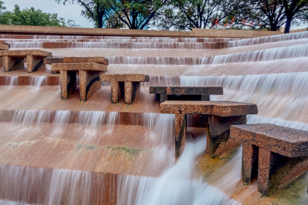 brown concrete fountain during daytime