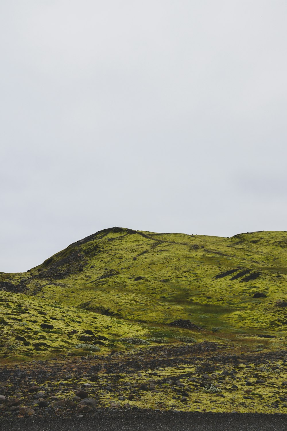 green mountain under white sky during daytime