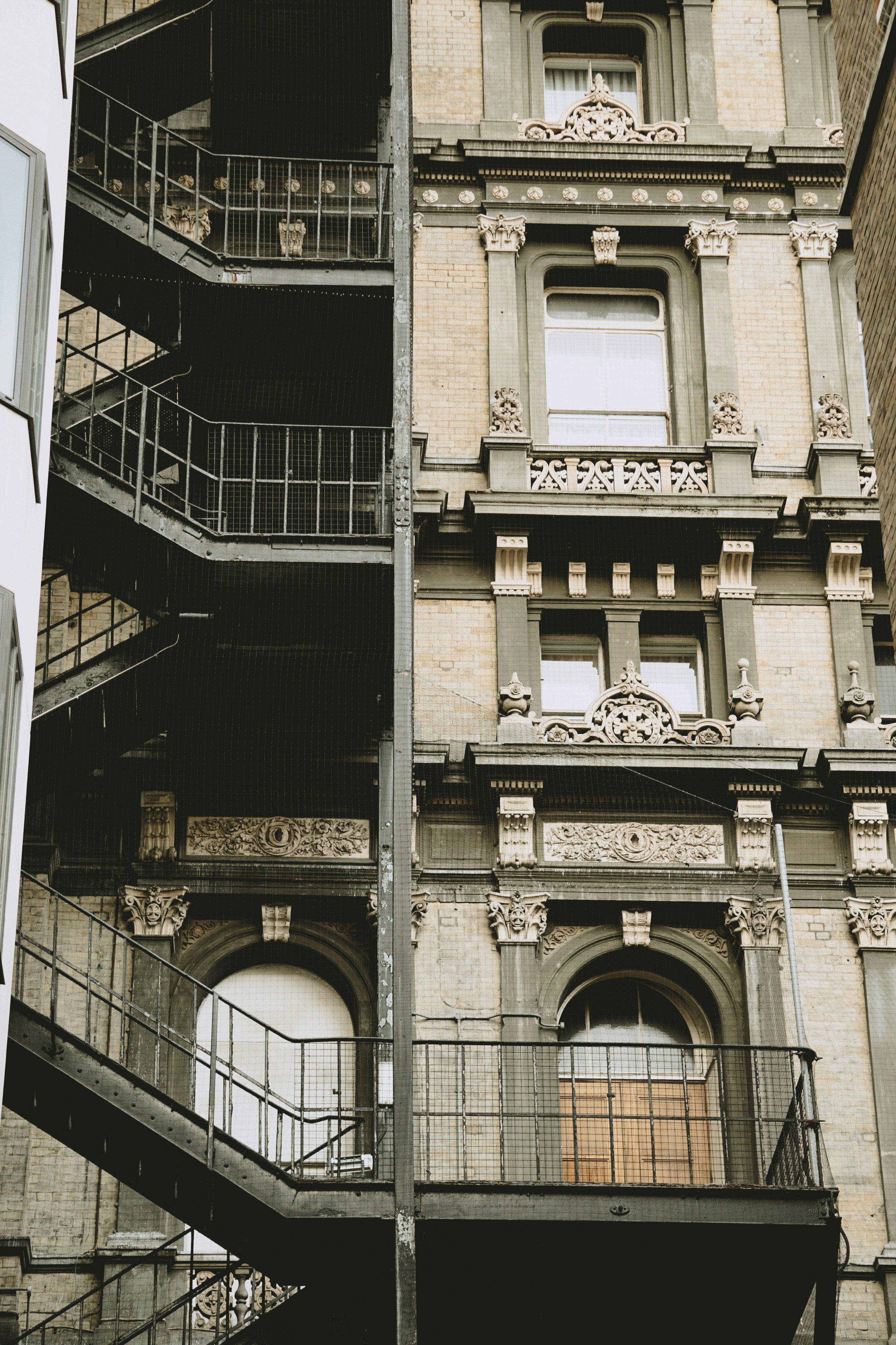 low angle photography of gray concrete building
