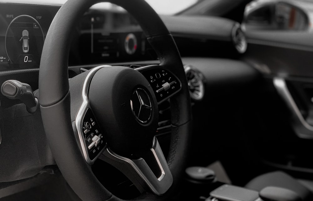 black and silver steering wheel