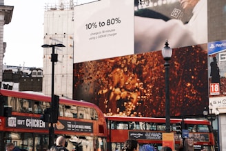 red double decker bus on road during daytime