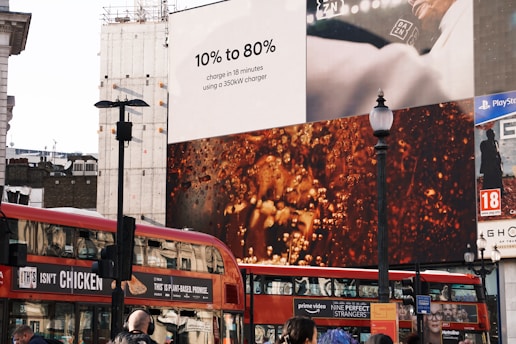 red double decker bus on road during daytime