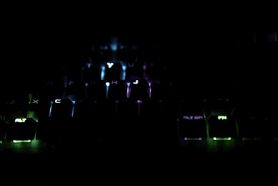 Modern wireless keyboard and mouse set with neon green backlight.