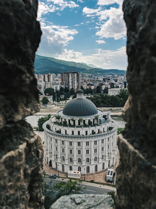 white dome building on cliff during daytime in Kale Fortress North Macedonia