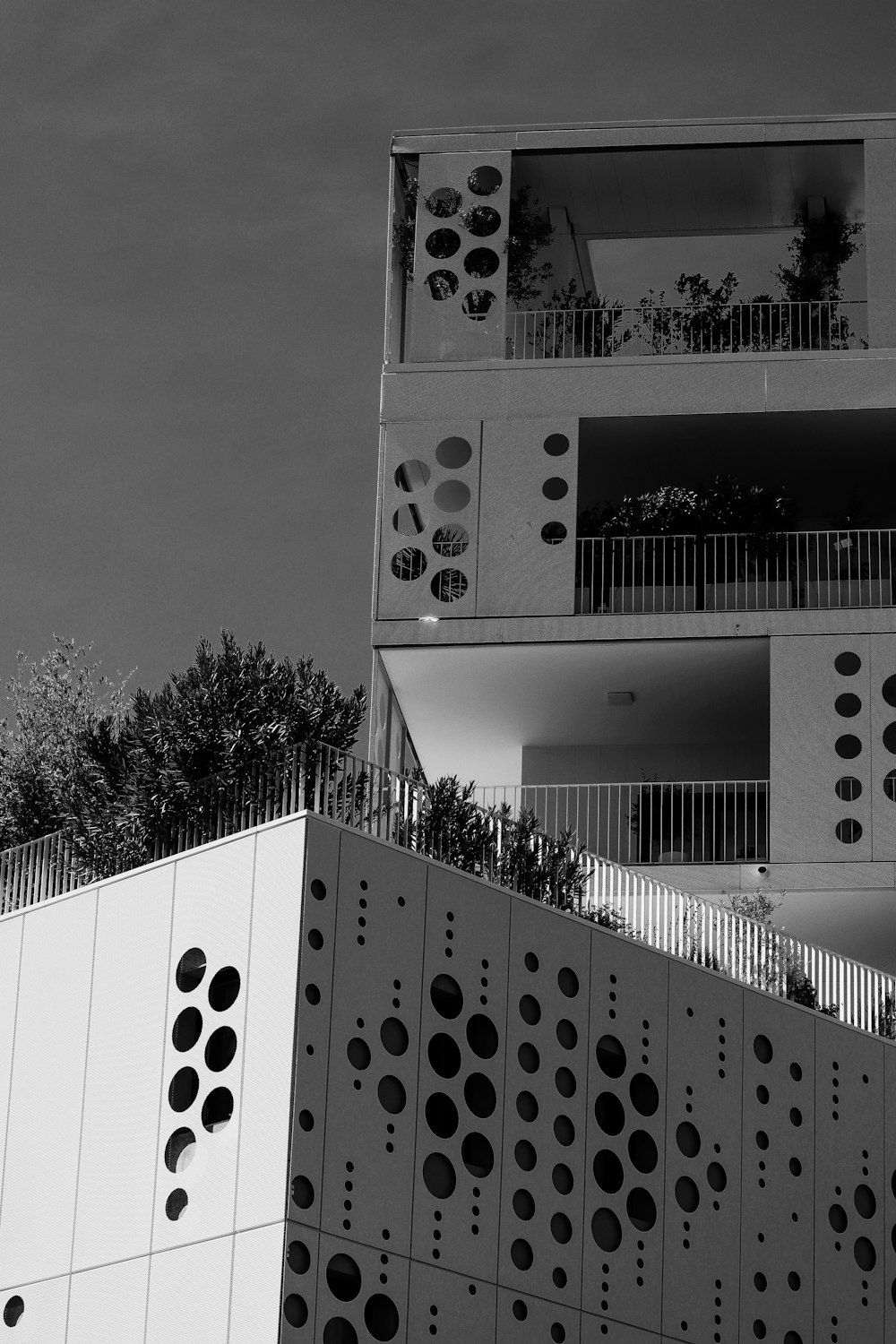 grayscale photo of building with lights