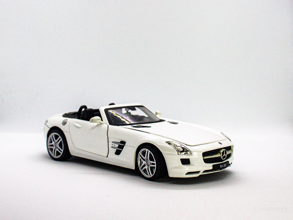 white mercedes benz convertible coupe