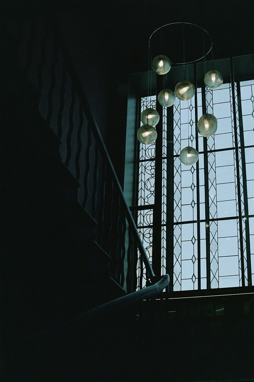 white pendant lamp turned on in room