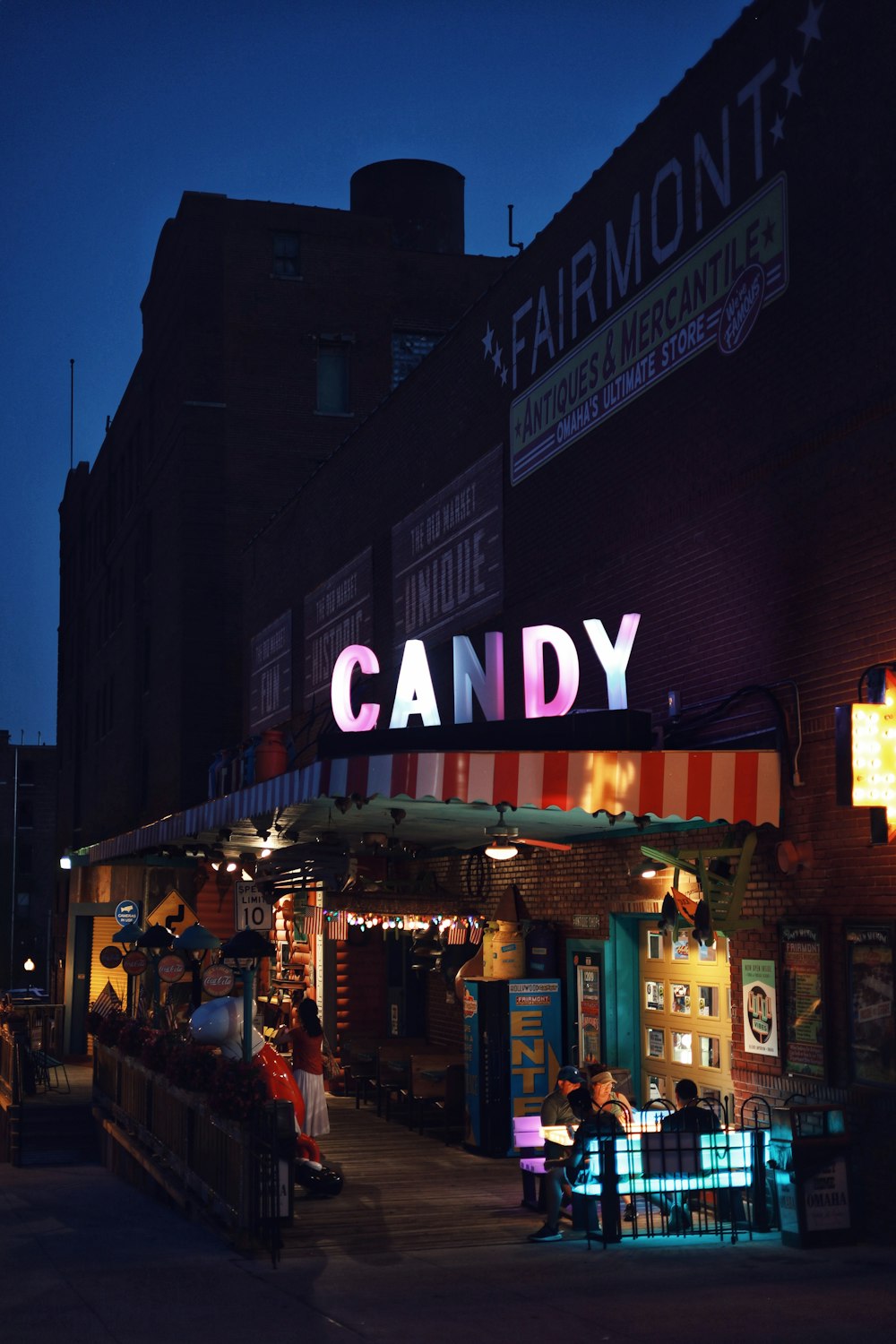 people walking on street during night time