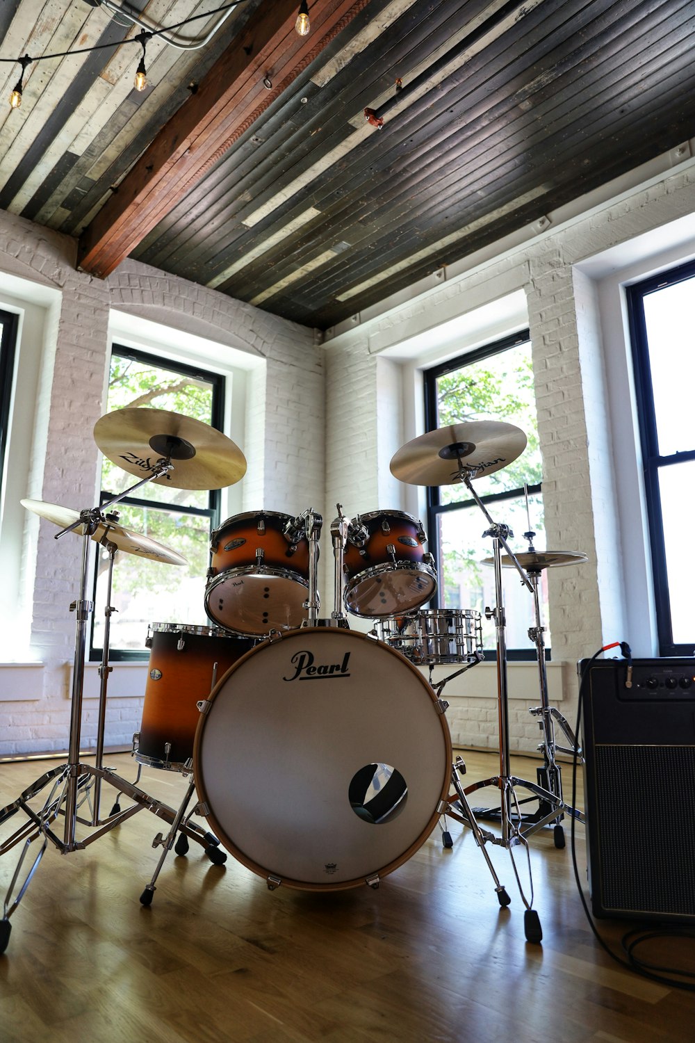 brown and white drum set