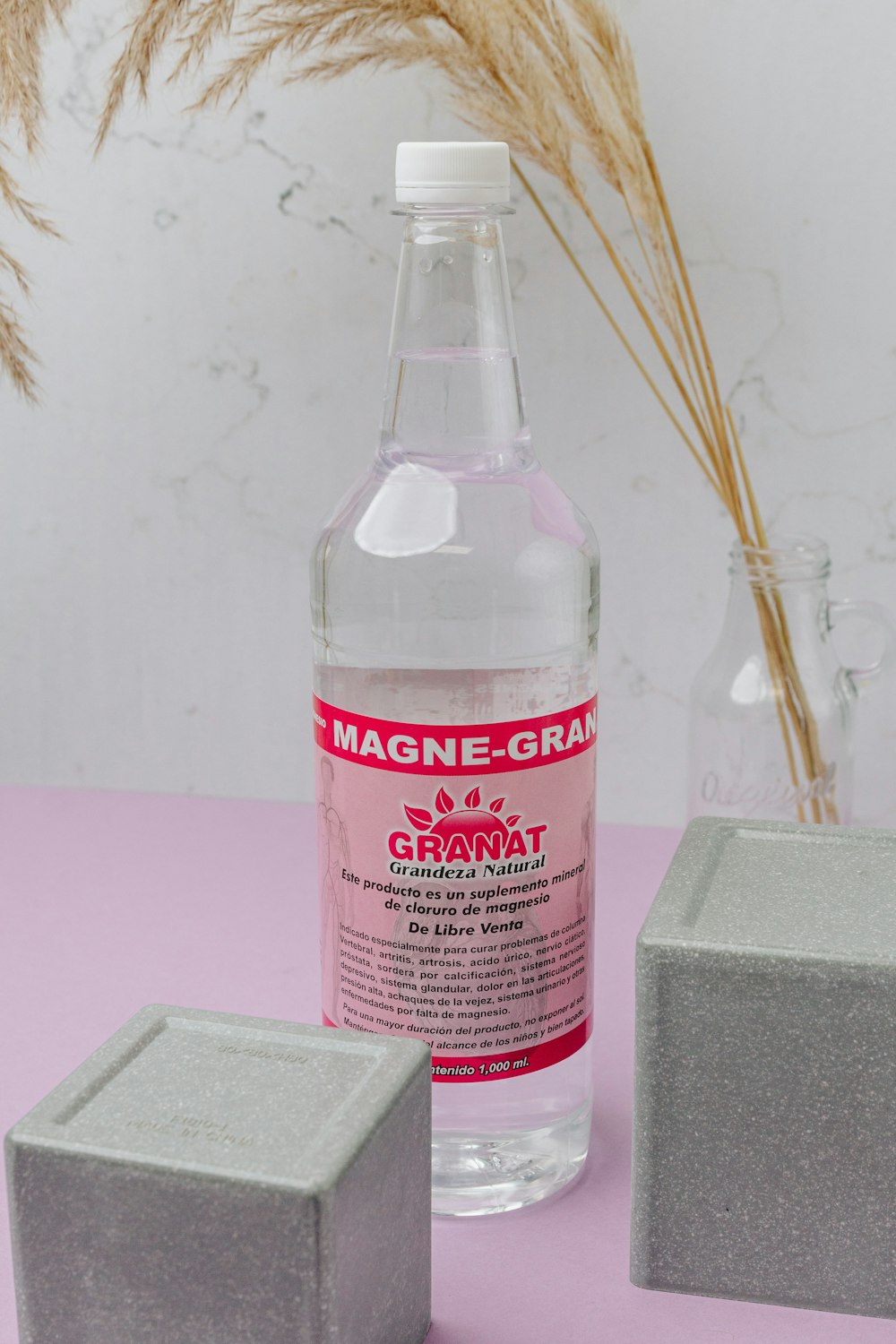 red and white labeled bottle photo – Free Image on Unsplash