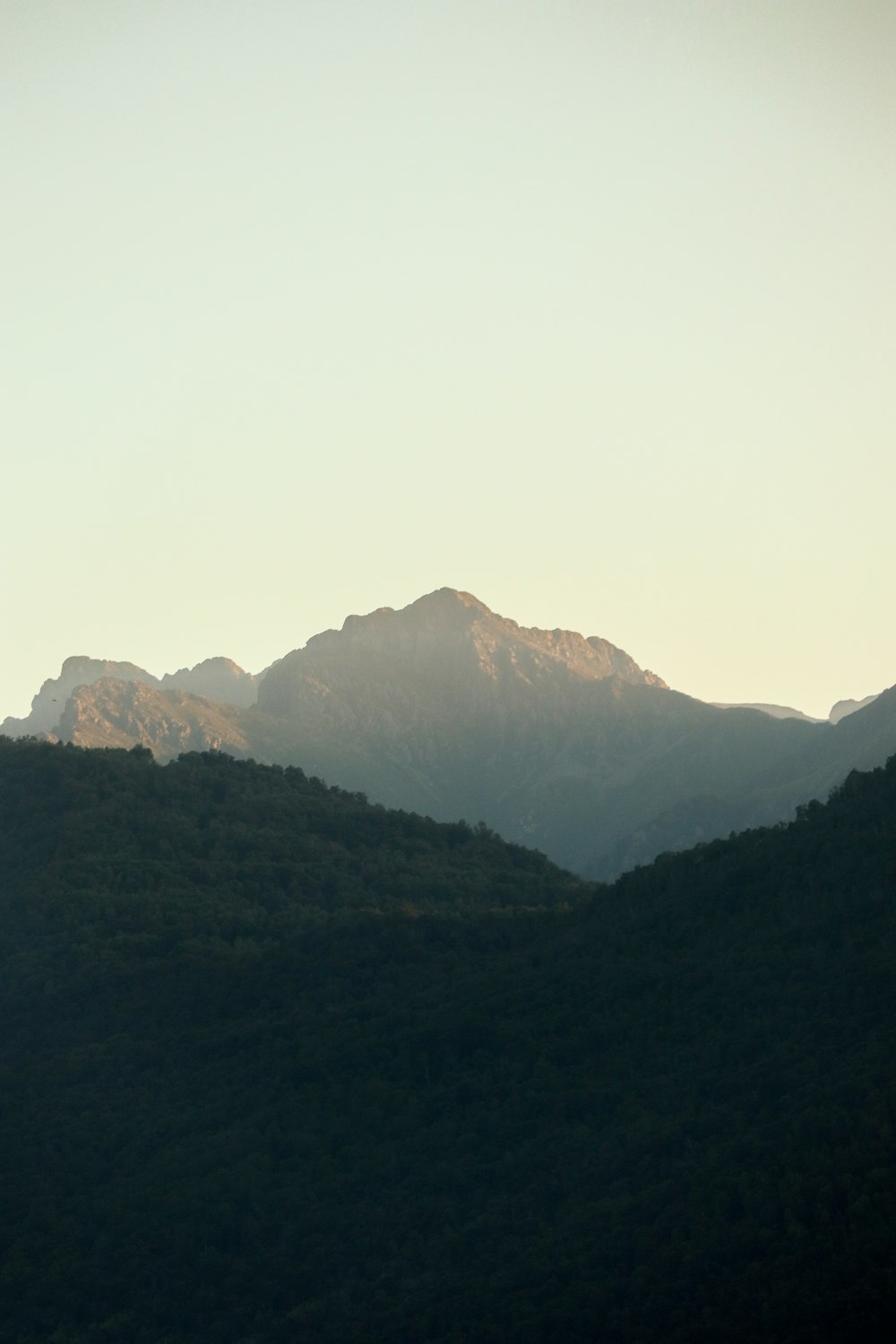 green mountains under white sky during daytime