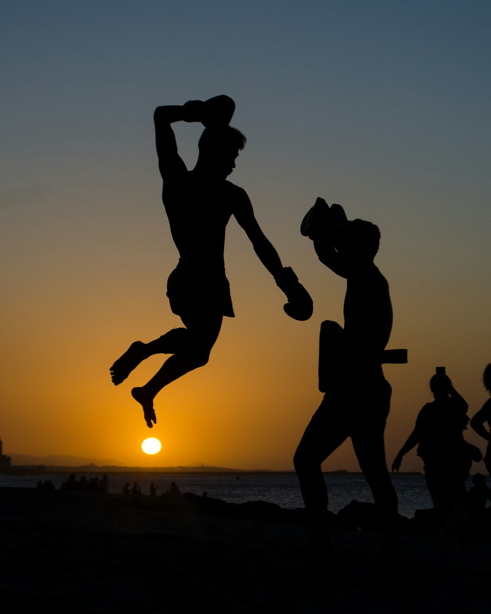 silhouette of people during sunset