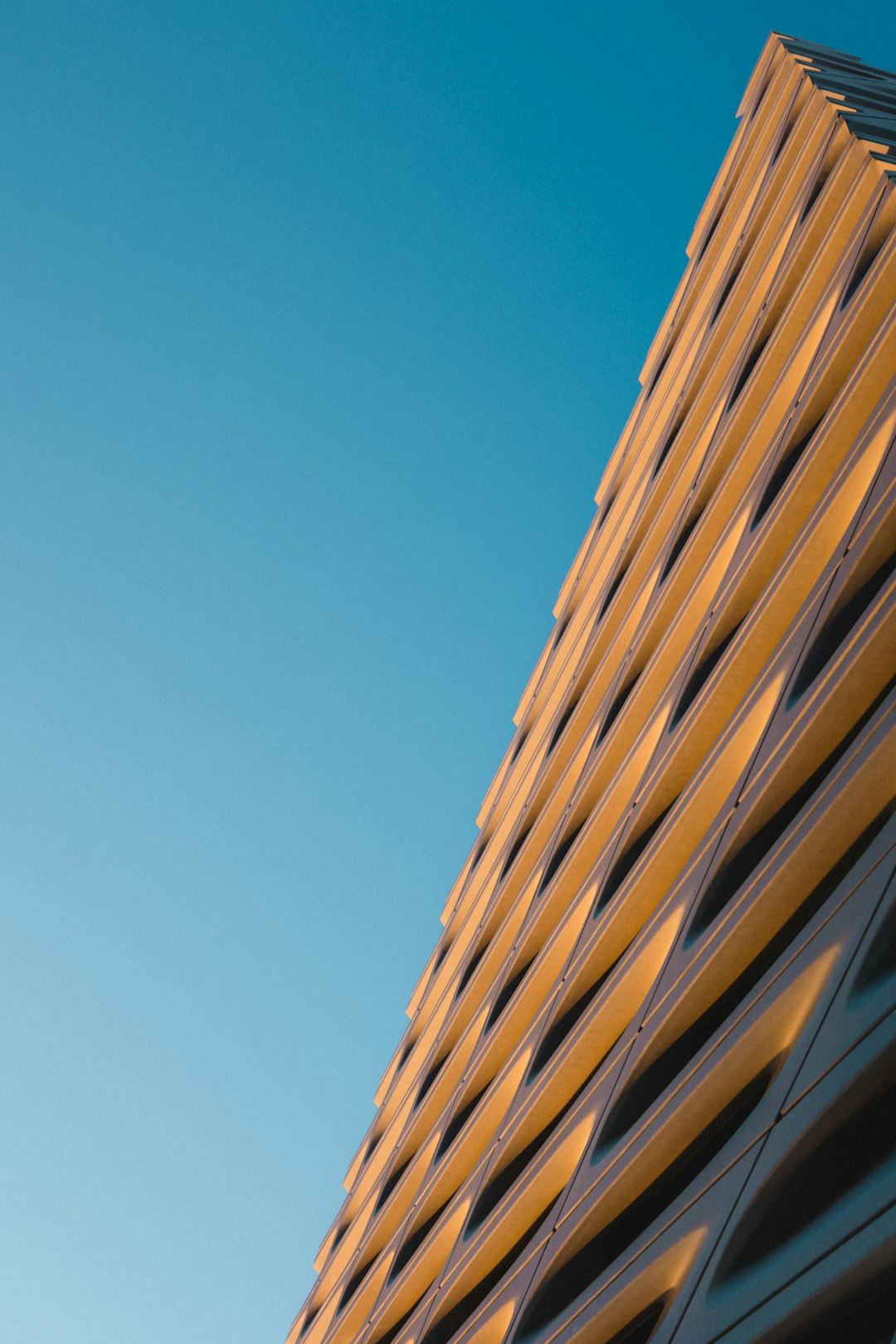 brown wooden building under blue sky during daytime