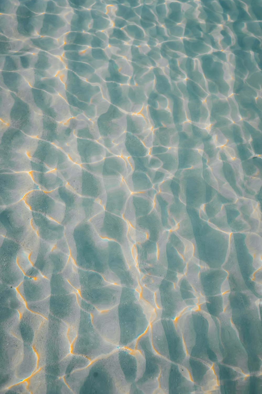 white and blue water during daytime