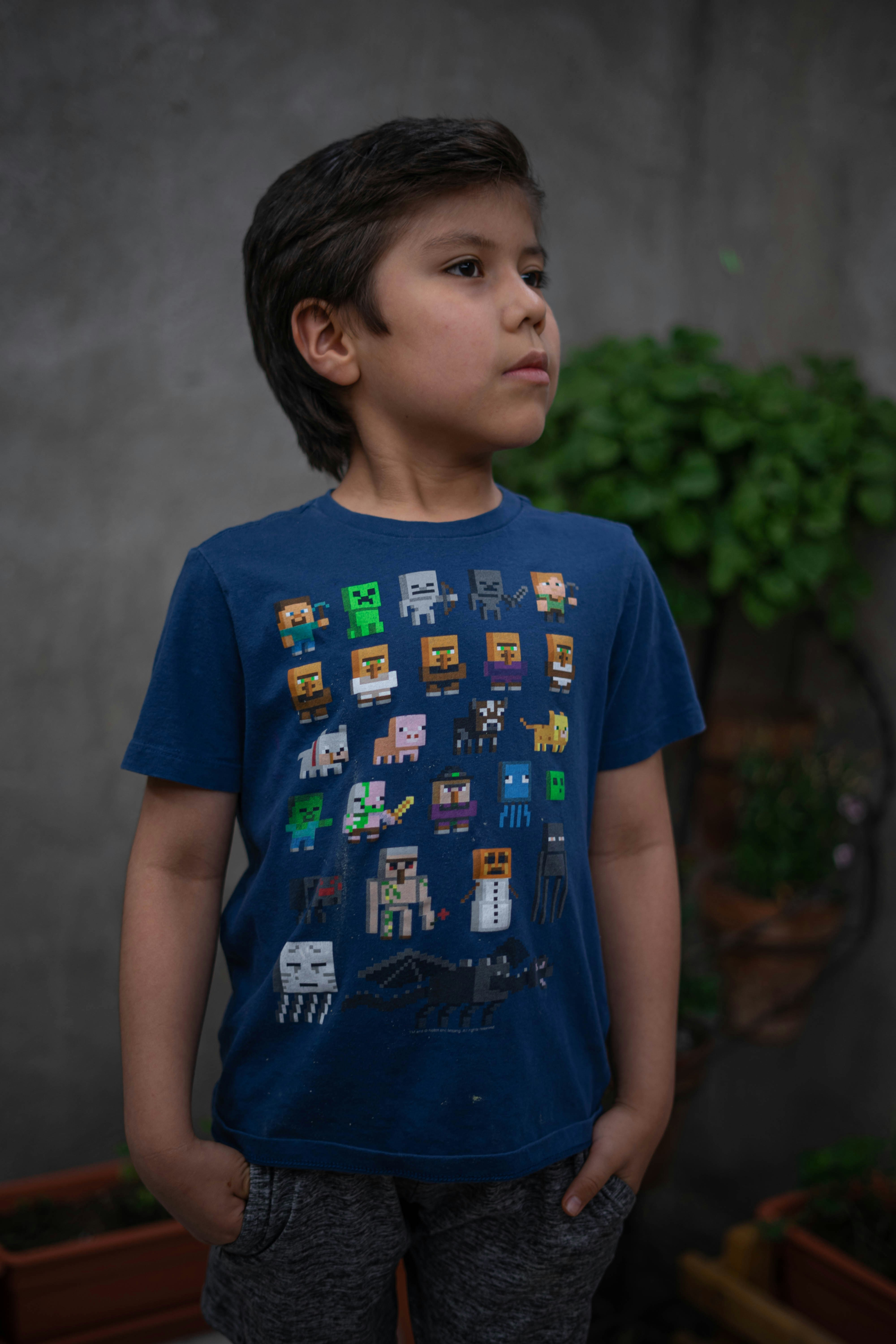 photo-1630345910963-1a697bb5262d?ixid=M3wxMjA3fDB8MXxzZWFyY2h8Mnx8a2lkcyUyMHQtc2hpcnRzJTIwY2Fyc3xlbnwwfHx8fDE3NjA1MTI1Njh8MA\u0026ixlib=rb-4.1.0