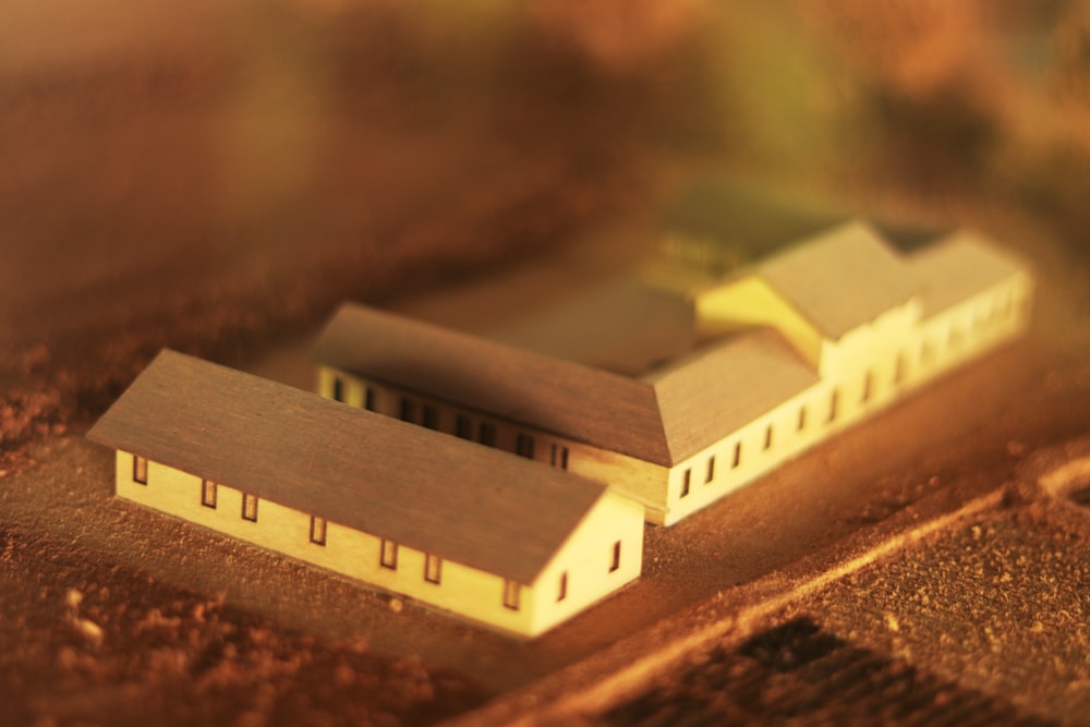 white and brown building miniature